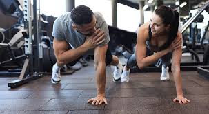Toning Bingo Wings: Your Ultimate Guide to Sculpting Sleek Arms at the Gym 3 Fitness trainer demonstrating arm toning exercises Haverhill