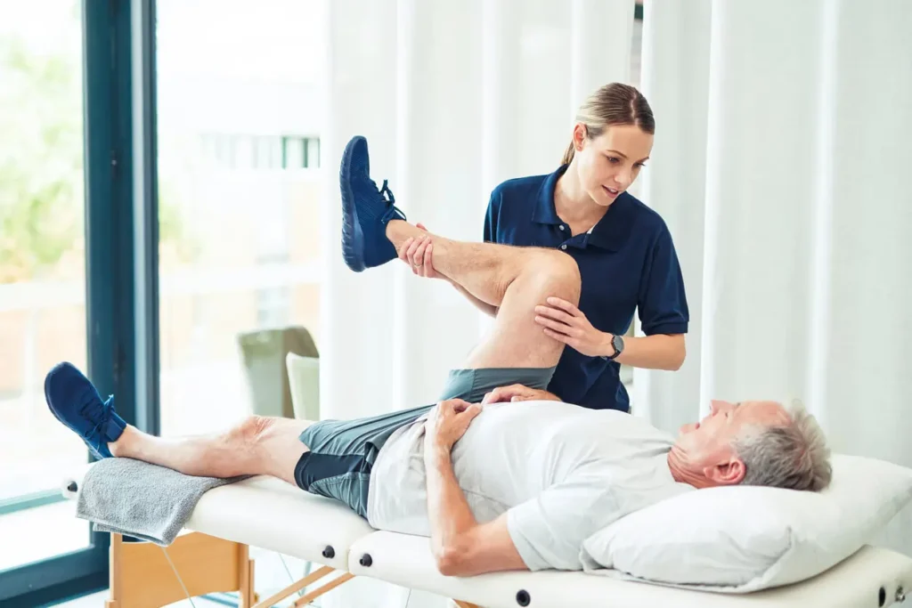 Revitalising Recovery: Effective Rehabilitation Strategies for Muscle Injuries 3 Physiotherapist assisting a patient with muscle recovery exercises Haverhill