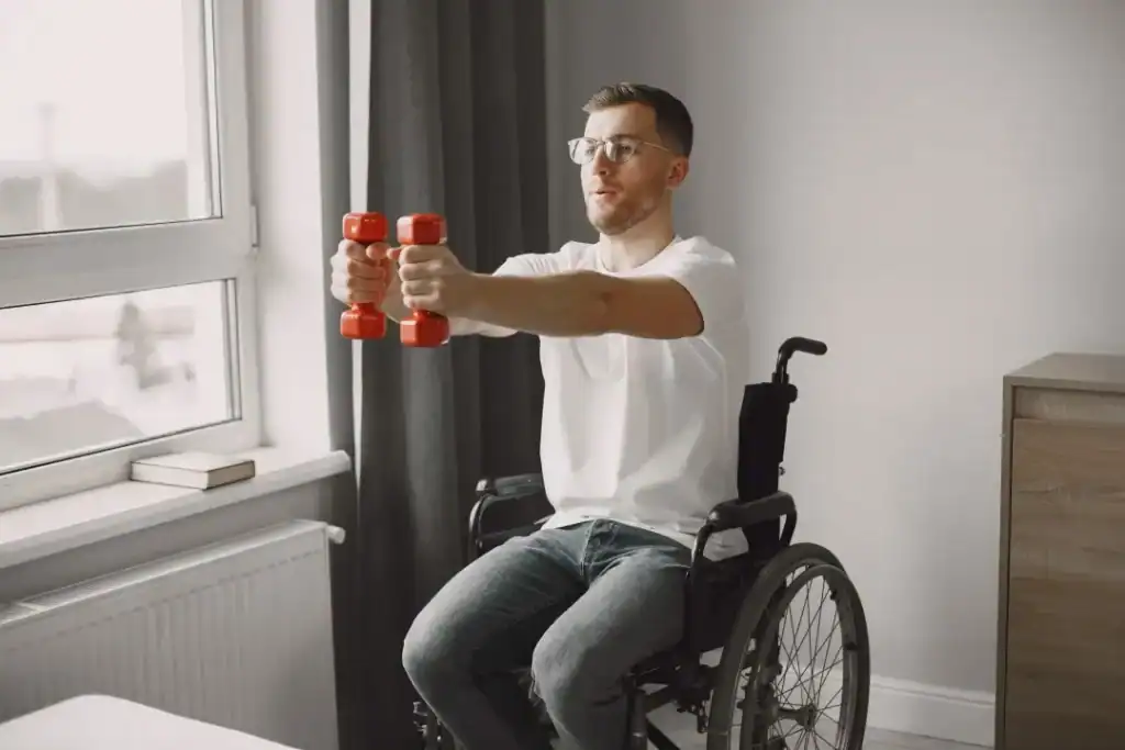 Image of man doing exercise in his wheelchair to aid weight loss Haverhill