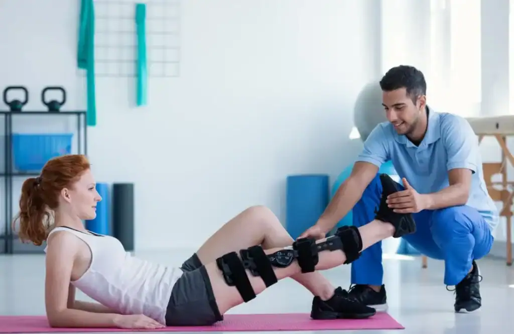 Debunking Meal Timing Myths: The Truth About Muscle Recovery 1 Woman having treatment to help muscle recovery Haverhill after an injury